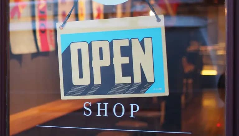 Open shop with merchandise displays, symbolizing the process of setting up a WooCommerce shop.